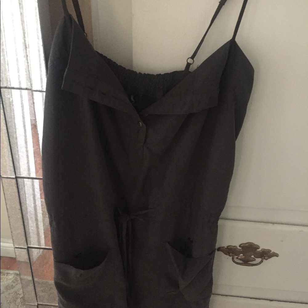 Shift dress with drawstrings and front pockets.